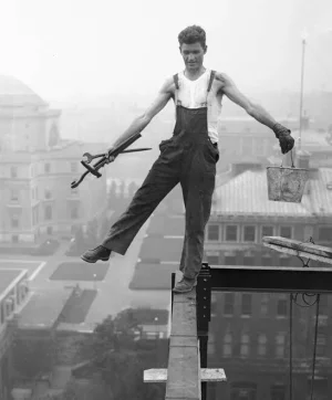 worker-balancing-on-beam.webp worker-balancing-on-beam.webp